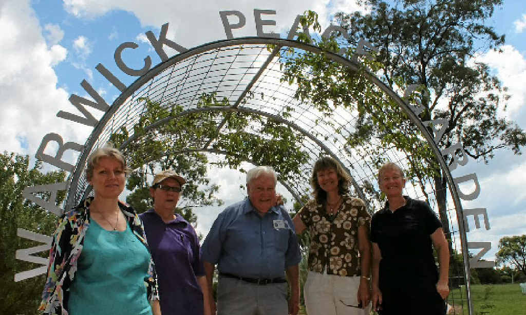 Ruth Power, Kris Kemp, Bill Greer, Lenore Neville and Sue Keong admire the results of the hard work. Ruth Power, Kris Kemp, Bill Greer, Lenore Neville and Sue Keong admire the results of the hard work.